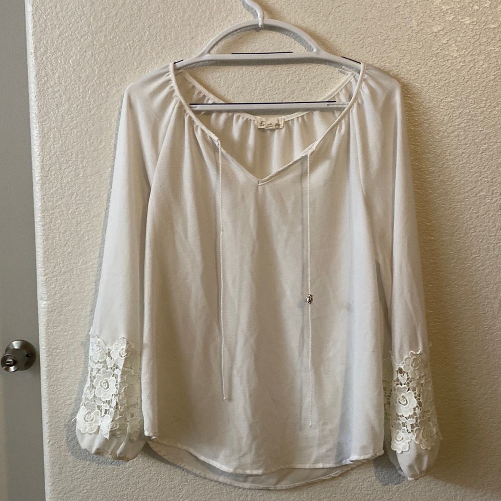 I am selling this white Emi & Joe shirt size small